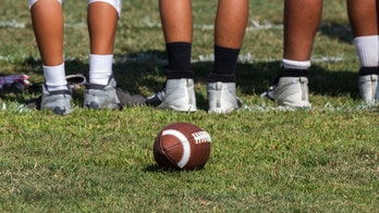 California high school football player tackles teammate after interception for going the wrong way