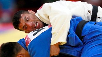Iran banned from world judo until it agrees to face Israel