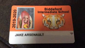 Child wears hot dog costume in school picture after his parents dare him to do it