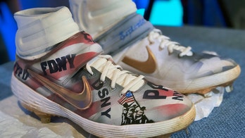 Mets' Alonso donates customized cleats to 9/11 museum