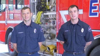 Dramatic video shows two firemen in Washington state rescuing American flag during two-alarm blaze