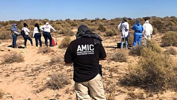 Mexican mothers discover dozens of bodies buried in mass grave near resort town south of Arizona border