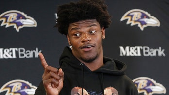 Ravens' Lamar Jackson narrowly avoids diving into jet ski while playing on beach