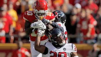 Kansas City Chiefs' Tyreek Hill goes airborne for first touchdown in return from injury
