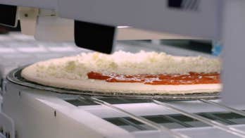 Robotic pizza-making machine can churn out 300 pies an hour, tech company claims
