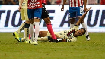 Mexican soccer star Giovani dos Santos suffers nasty leg wound after getting tackled