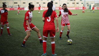 Jordan women's soccer team halts match so opposing player can fix hijab