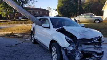 North Carolina parent 'extremely lucky' after utility pole smashes through car window