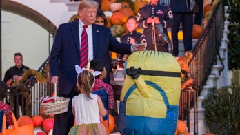 Internet reacts to Trump putting candy on top of child's 'Minion' costume