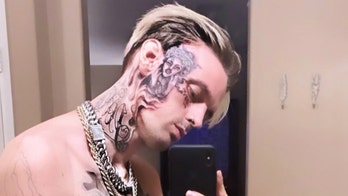 Aaron Carter's face tattoo artist says he tried to talk singer out of it