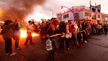 Ecuador's government flees capital as violent protests erupt in wake of fuel price hikes