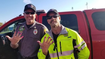 Utah firefighters let 'very scared' girl, 2, paint their nails after car crash