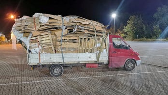 Overloaded junk truck Twitter-shamed by cops