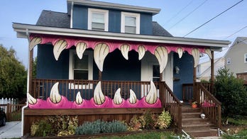 Baltimore couple creates 'monster house' Halloween display for trick-or-treaters