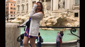 Tourist accidentally photographs couple's engagement at Trevi Fountain, hopes to find them