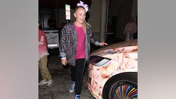 JoJo Siwa's Tesla Model X is covered in JoJo Siwas