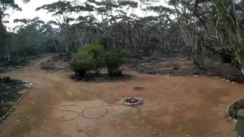Missing Australian woman found in outback after 'SOS' message is spotted on security camera
