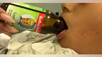 Boy, 7, gets tongue stuck in glass bottle while trying to drink last drop