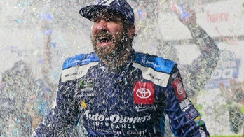 Martin Truex Jr. wins Martinsville NASCAR race to advance in playoffs