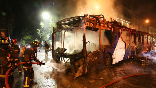 Chile capital hit by violent protests over metro fare hikes; state of emergency declared