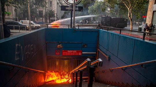 Chile riots leave 3 dead in supermarket fire as curfew declared, president reverses subway fare hikes