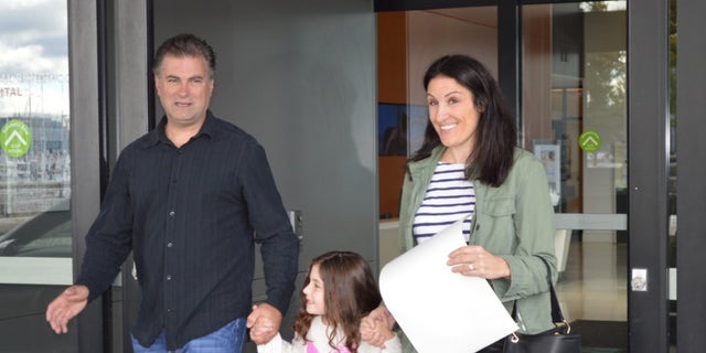 Sophia Garabedian pictured leaving the hospital with her parents.