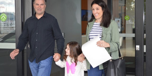 Sophia Garabedian pictured leaving the hospital with her parents.