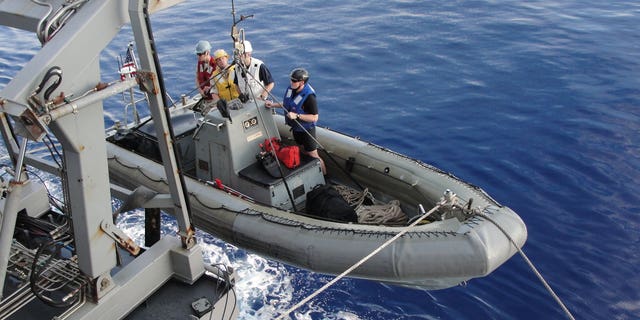 Sailors aboard the guided-missile cruiser USS Leyte Gulf (CG 55) conduct rigid-hull inflatable boat operations. (U.S. Navy photo by Ensign Lisa M. Holsberger)