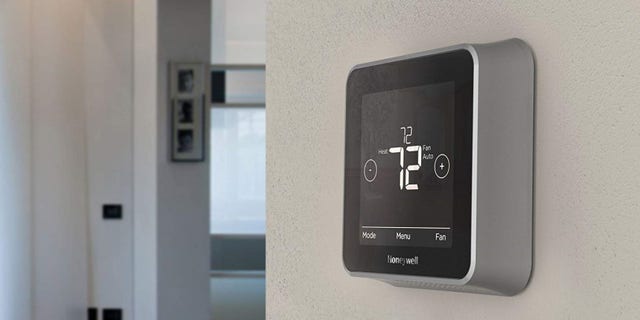A Honeywell smart thermostat is seen above.