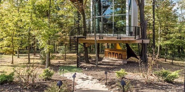 The property's two-story treehouse was built for Brown, and documented on an episode of Animal Planet’s “Treehouse Masters.