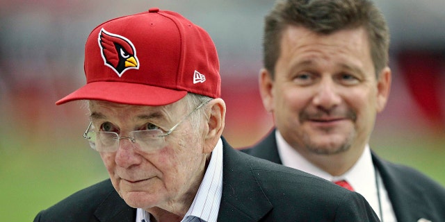 Bill Bidwill is pictured with son Michael Bidwill, the Cardinals team president, on the sidelines prior to the 2012 NFL season opener against the Seattle Seahawks. (AP Photo/Paul Connors, File)