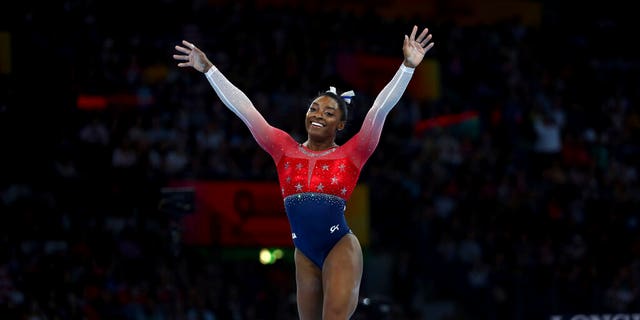 "I feel like I never think of records," Biles says of her performances. "I just go out there and do what I came to do, which is compete for the country."