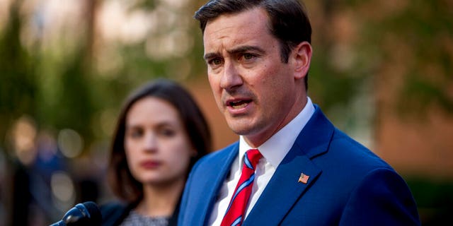 U.S. Attorney for the Eastern District of Virginia Zach Terwilliger, right, accompanied by Assistant U.S. Attorney Danya Atiyeh, left, announcing the arrest of Henry Kyle Frese, a Defense Intelligence Agency official charged with leaking classified information to two journalists.