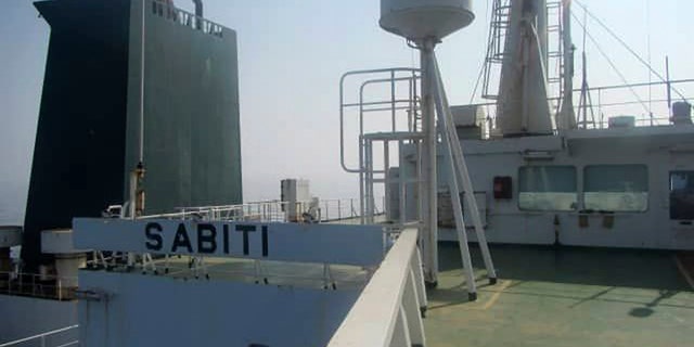 This photo released by the official news agency of the Iranian Oil Ministry, SHANA, shows Iranian oil tanker Sabiti traveling through the Red Sea Friday, Oct. 11, 2019. Two missiles struck the Iranian tanker Sabiti traveling through the Red Sea off the coast of Saudi Arabia on Friday, Iranian officials said, the latest incident in the region amid months of heightened tensions between Tehran and the U.S. (SHANA via AP)