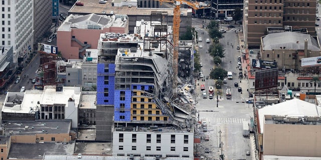 This aerial photo shows the Hard Rock Hotel, which was under construction, after a fatal partial collapse in New Orleans. (AP Photo/Gerald Herbert)