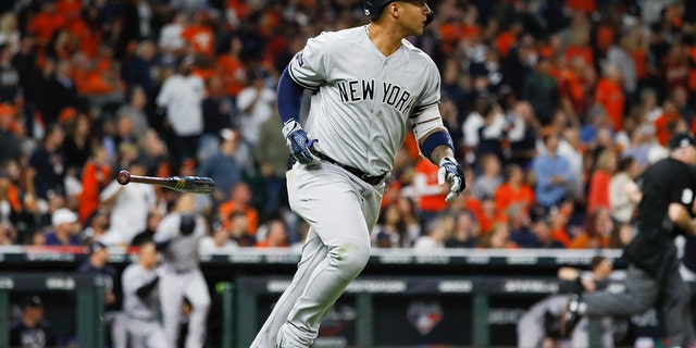 New York Yankees' Gleyber Torres rounds the bases after a home run during the sixth inning in Game 1 of baseball's American League Championship Series against the Houston Astros, Oct. 12, 2019, in Houston. (Associated Press)