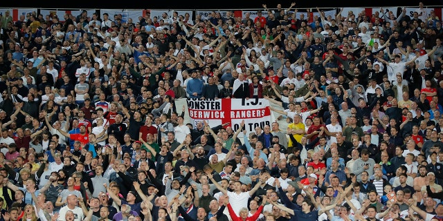 England fans celebrate during the Euro 2020 group A qualifying soccer match between Bulgaria and England, at the Vasil Levski national stadium, in Sofia, Bulgaria, Monday, Oct. 14, 2019. (AP Photo/Vadim Ghirda)