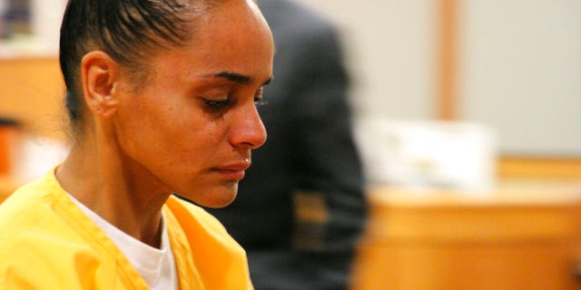 Gina Virgilio leaves the courtroom Monday, Oct. 14, 2019, in Anchorage, Alaska.