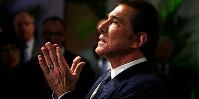 FILE: Casino mogul Steve Wynn gestures listens during a news conference in Medford, Mass.