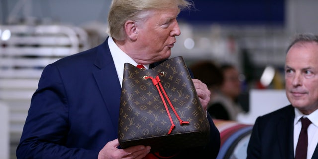 President Trump tours the Louis Vuitton Workshop Rochambeau in Alvarado, Texas, Thursday, Oct. 17, 2019. (AP Photo/Andrew Harnik)