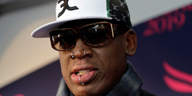 In this Jan. 26, 2019, file photo, retired NBA basketball player Dennis Rodman is interviewed on the blue carpet at the Pegasus World Cup Invitational Horse Race at Gulfstream Park in Hallandale Beach, Fla.