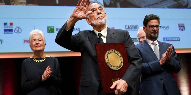 US director Francis Ford Coppola holds his award during the Lumiere Award ceremony of the 11th Lumiere Festival, in Lyon, central France. 