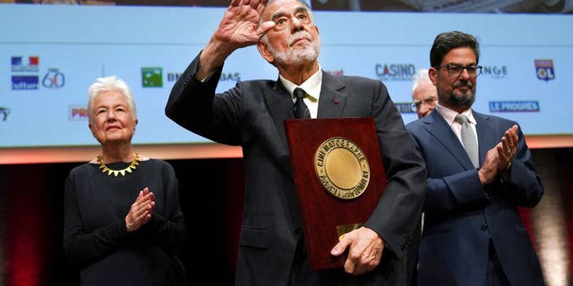 US director Francis Ford Coppola holds his award during the Lumiere Award ceremony of the 11th Lumiere Festival, in Lyon, central France. 