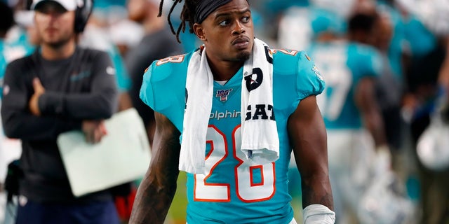 In this Aug. 8, 2019, file photo, Miami Dolphins safety Bobby McCain watches during the second half of a preseason NFL football game against the Atlanta Falcons in Miami Gardens, Fla. McCain will be disciplined by the team for his verbal confrontation with a 13-year-old boy who was rooting for the Buffalo Bills. (AP Photo/Wilfredo Lee, File)