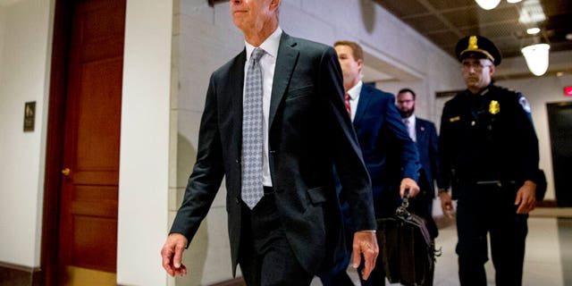 Ambassador William Taylor arrives for a closed door meeting to testify as part of the House impeachment inquiry into President Donald Trump, on Capitol Hill in Washington, Tuesday, Oct. 22, 2019. (AP Photo/Andrew Harnik)