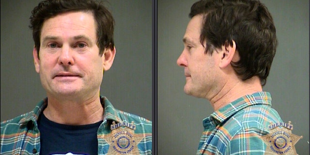 This image provided by the Washington County Sheriff's Office shows booking photos of actor Henry Thomas. Authorities say Thomas, the actor who starred as a child in "E.T. the Extra Terrestrial," was arrested for driving under the influence in Oregon. The 48-year-old was booked into the Washington County Jail and faces the misdemeanor charge after police said they found him Monday in a stationary car.