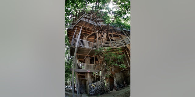 The 97-foot tall, 10-story treehouse in East Tennessee caught fire and quickly burned down Tuesday, Oct. 22. No injuries were reported.