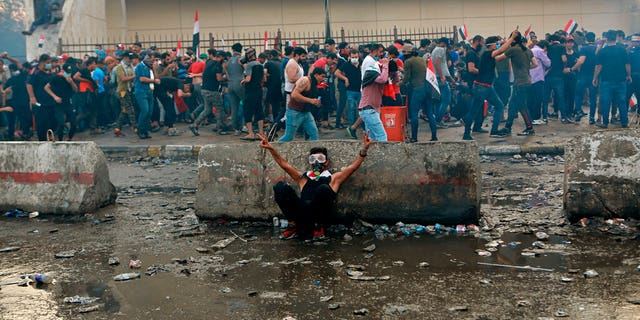 Anti-government protesters gather in Tahrir Square during a demonstration in central Baghdad