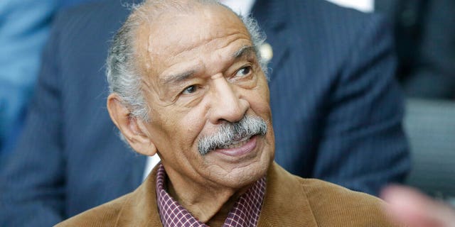 FILE - In an April 11, 2016 file photo, Congressman John Conyers is seen during a ceremony for former U.S. Sen. Carl Levin, in Detroit. Detroit police say the former congressman died at his home on Sunday, Oct. 27, 2019. He was 90. ((AP Photo/Carlos Osorio, File)