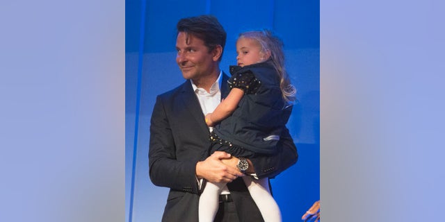 Bradley Cooper and his daughter at the Kennedy Center event. (Photo by Owen Sweeney/Invision/AP)